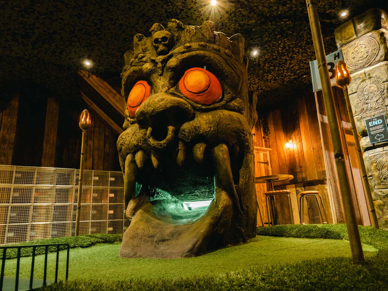 A large totem head statue from a section of Hackers indoor crazy golf course in Essex